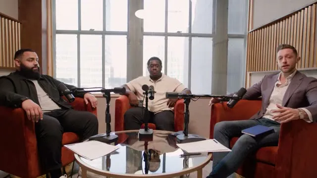 A Finlay Films-produced podcast recording, three hosts on camera with the NYC skyline behind them