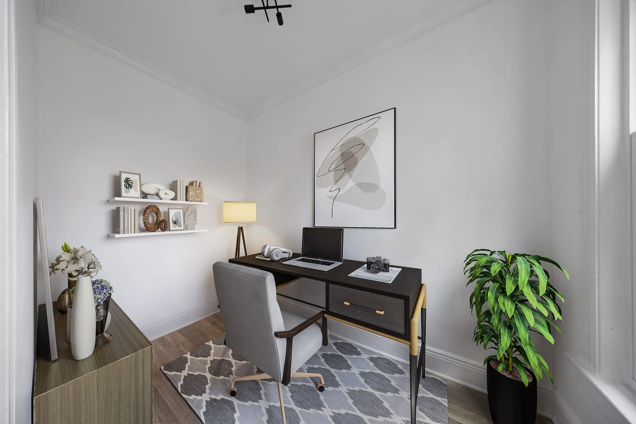 A room shown empty, then virtually staged by Finlay Films